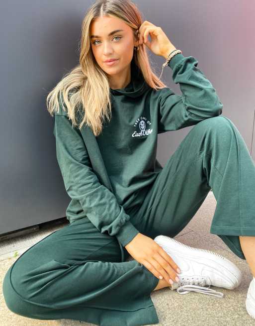 ASOS DESIGN tracksuit oversized hoodie straight leg sweatpants with take care embroidery in dark green