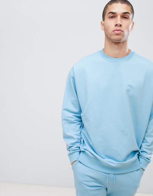 ASOS DESIGN tracksuit oversized sweatshirt super skinny joggers in sky blue