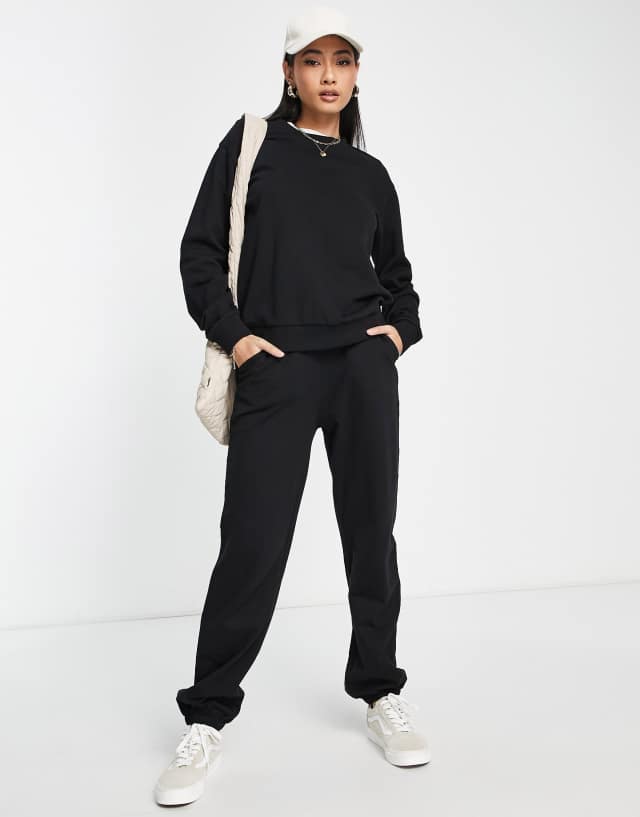 ASOS DESIGN tracksuit slim sweat / sweatpants in black - BLACK