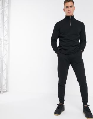 ASOS DESIGN tracksuit with half zip track top in black