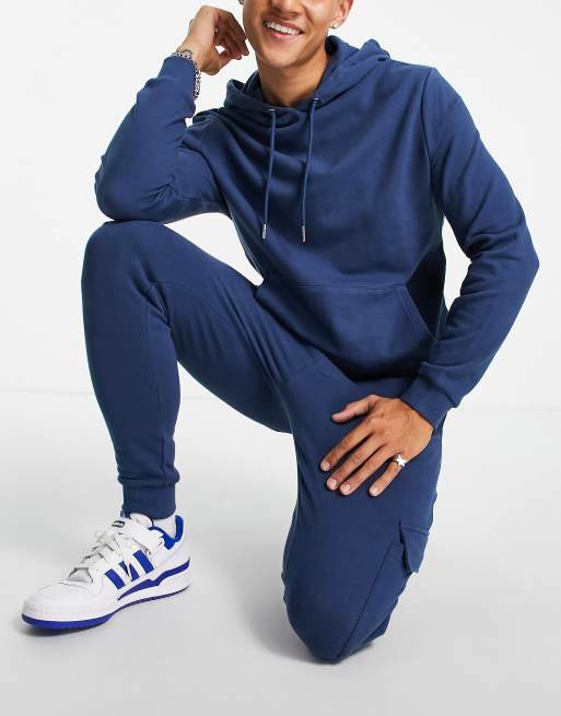 ASOS DESIGN tracksuit with hoodie & cargo skinny jogger in dark blue