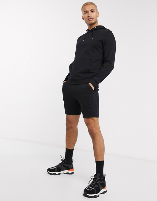 ASOS DESIGN tracksuit with hoodie & shorts in black | ASOS