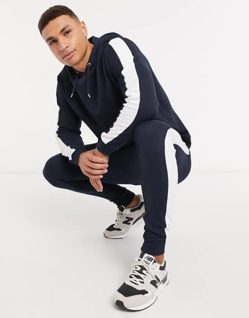 ASOS DESIGN tracksuit with hoodie & side stripe in navy | ASOS