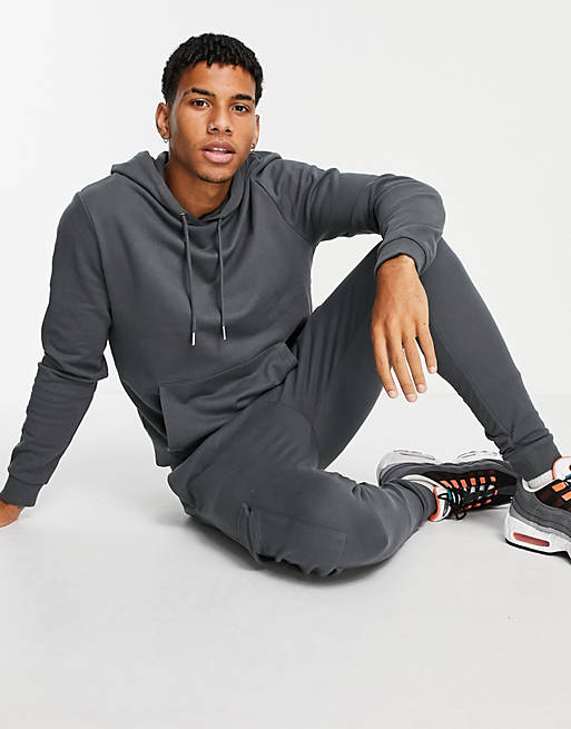  tracksuit with hoodie & skinny cargo joggers in washed black 