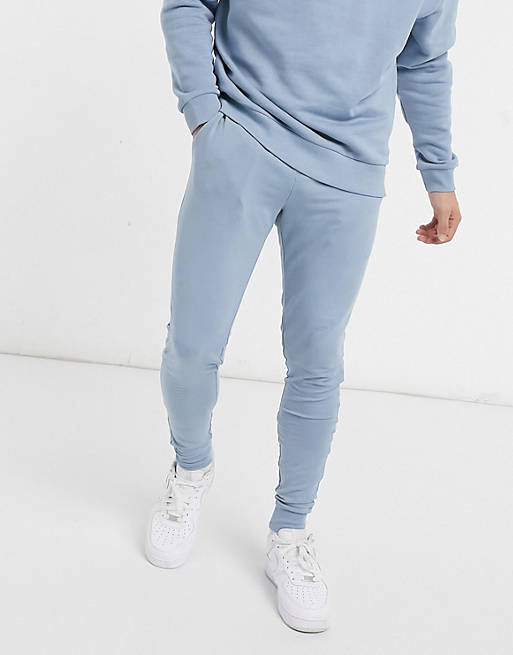 Asos Men Sport & Swimwear Sportswear Sports Pants Tracksuit with oversized half zip and super skinny sweatpants in blue 