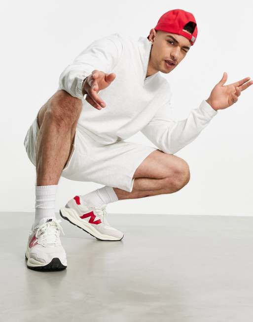 ASOS DESIGN tracksuit with oversized half zip sweatshirt and oversized shorts in white heather