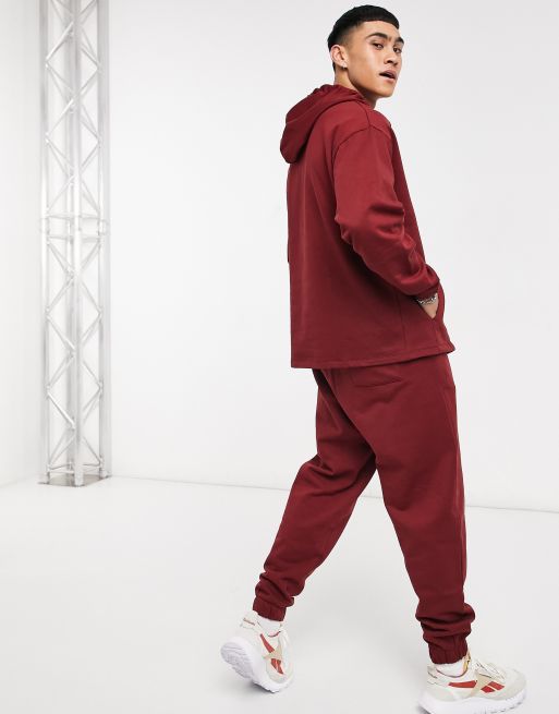 ASOS DESIGN tracksuit with oversized hoodie & oversized joggers in burgundy  - RED