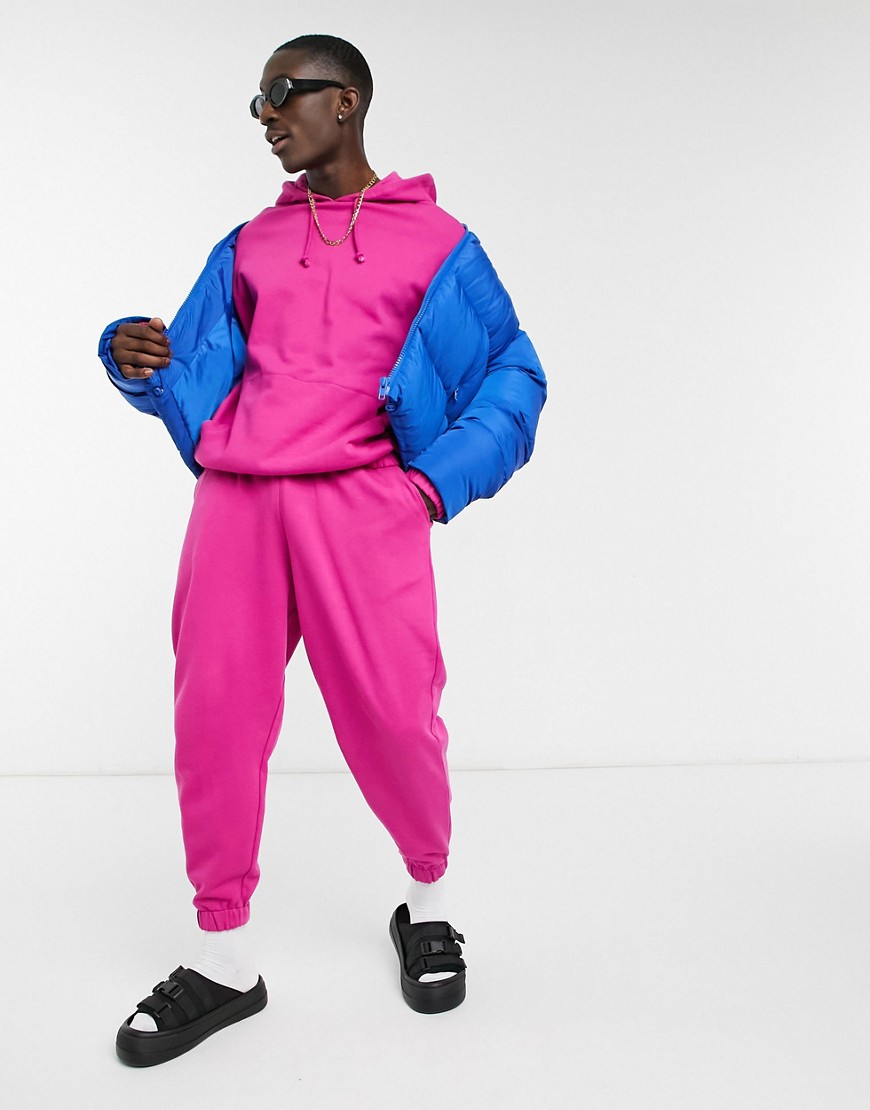 ASOS DESIGN tracksuit with oversized hoodie & oversized sweatpants in bright pink
