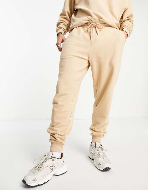 ASOS DESIGN tracksuit with oversized sweatshirt and tapered joggers in beige