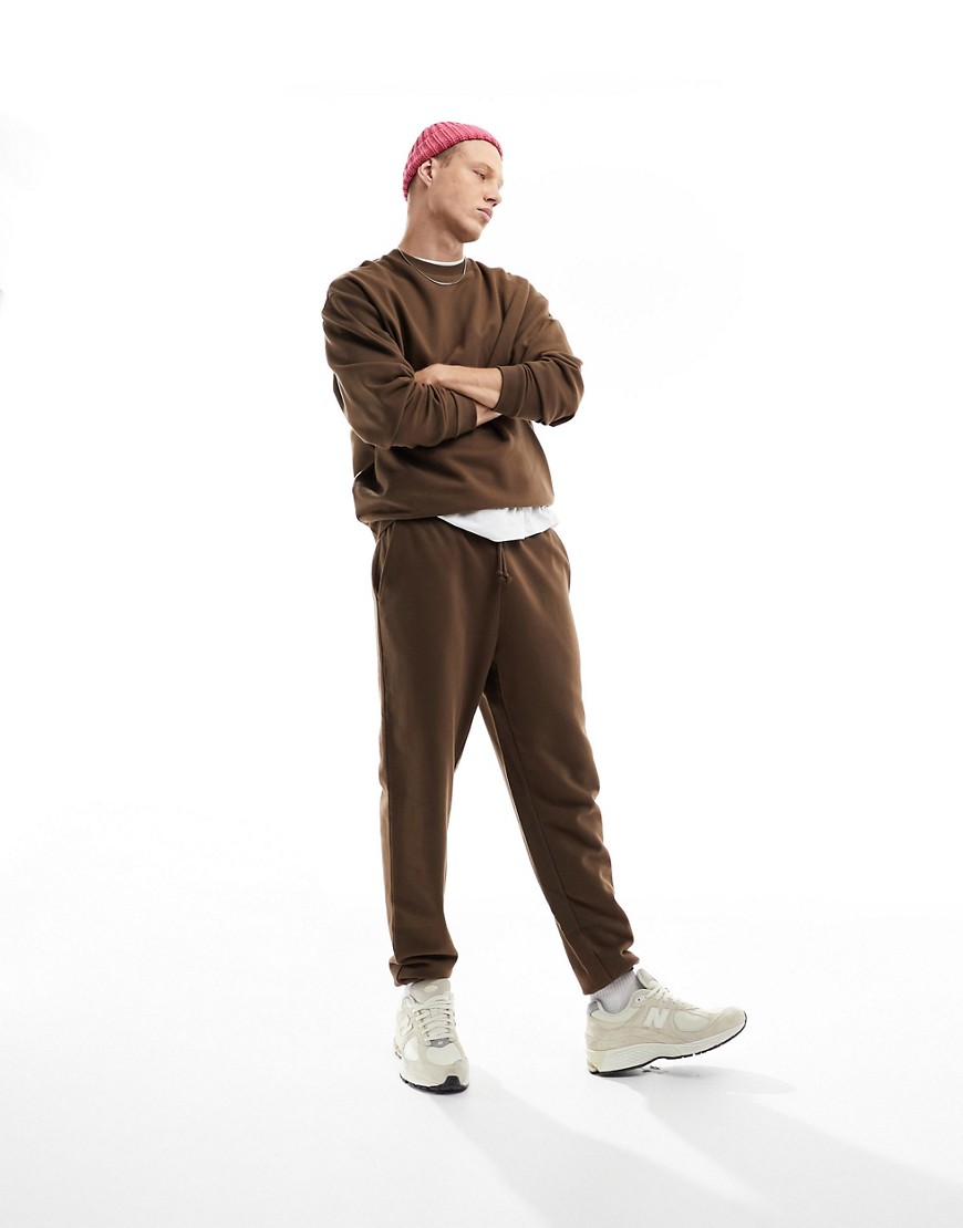 ASOS DESIGN tracksuit with oversized sweatshirt and tapered joggers in brown