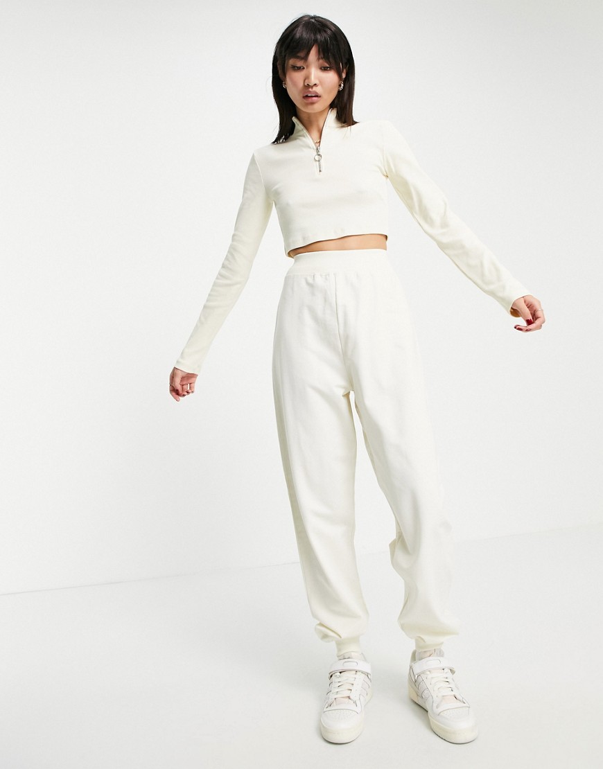 ASOS DESIGN tracksuit with rib funnel neck jacket and sweatpants in biscuit-Neutral