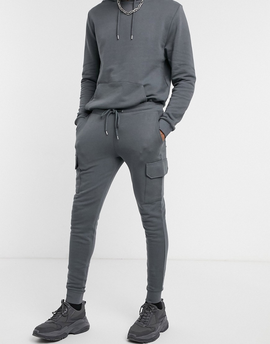 ASOS DESIGN tracksuit with skinny cargo joggers in washed black