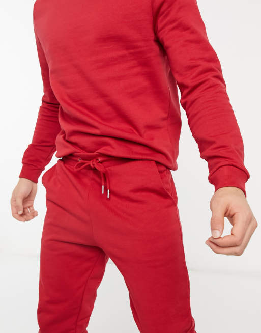 ASOS DESIGN tracksuit with sweatshirt and skinny joggers in red - RED