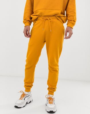 orange colour tracksuit