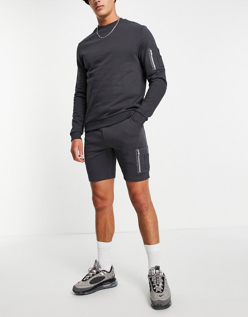 ASOS DESIGN tracksuit with sweatshirt & skinny shorts with MA1 pocket in black