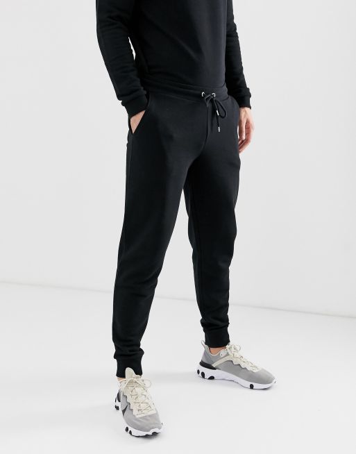 ASOS DESIGN tapered joggers in black