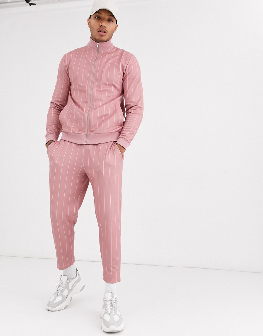 ASOS DESIGN tracksuit with track jacket and tapered joggers in pinstripe-Pink