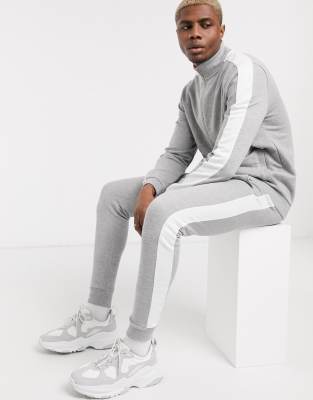 grey white and black striped tracksuit