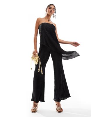 ASOS DESIGN - Trägerloser plissierter Jumpsuit in Schwarz mit weitem Bein