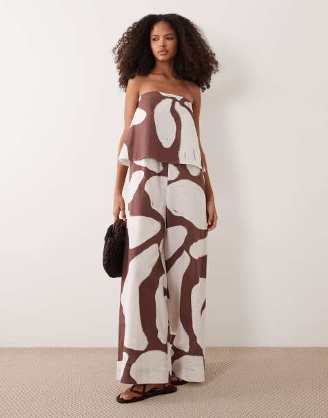 ASOS DESIGN – Trägerloser, zweilagiger Jumpsuit mit braunem Muster - view 1