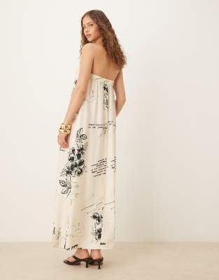 ASOS DESIGN - Trägerloses Maxikleid aus Cupro mit interessantem Print in Schwarz-Weiß-Bunt
