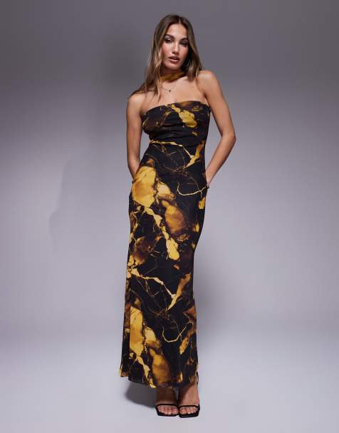 ASOS DESIGN – Trägerloses Netzstoff-Maxikleid mit Schnürdetail am Hals und gelbem Marmormuster - view 1