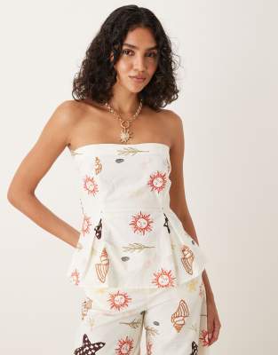 ASOS DESIGN - Trägerloses Oberteil aus Leinenmix mit aufgedruckten Urlaubsmotiven und abgenähter Taillenpartie, Kombitei...