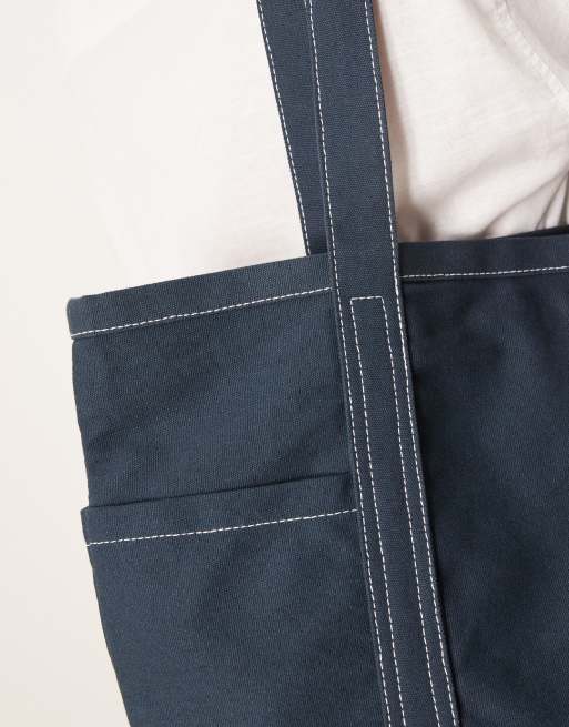 ASOS DESIGN – Tragetasche aus Canvas in Marineblau mit Ziernähten, 4 von 4