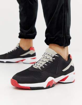 black trainers red sole