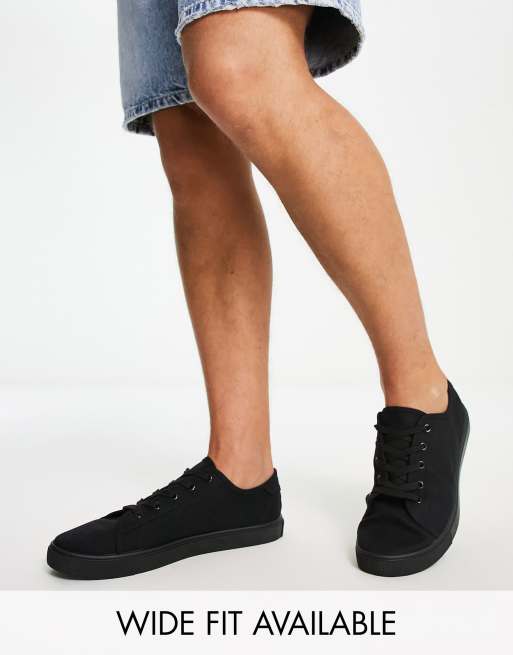 ASOS DESIGN trainers in black canvas