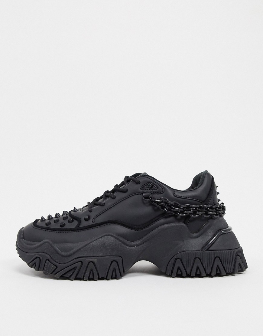 ASOS DESIGN trainers in black with chains and chunky sole