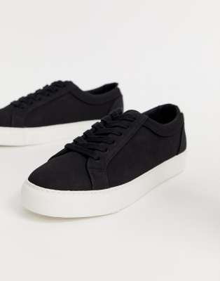 black sneaker with white sole