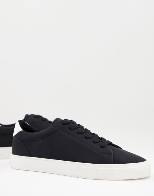 ASOS DESIGN trainers in black with chunky sole
