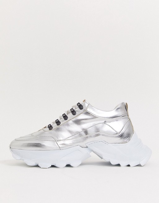 ASOS DESIGN trainers in silver with chunky cleated sole