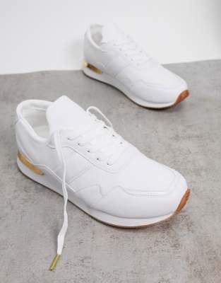 white trainers with gold back