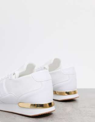 white trainers with gold back