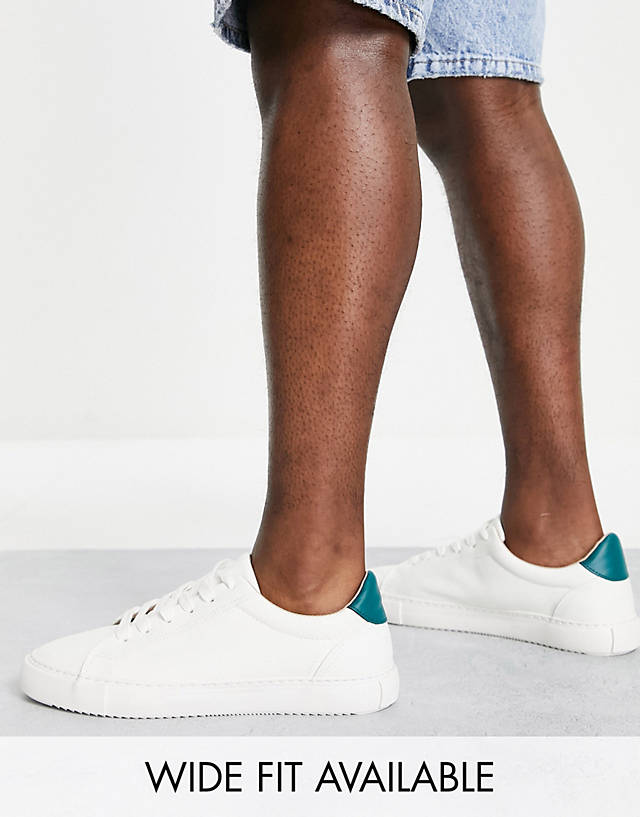 ASOS DESIGN - trainers in white with green back tab