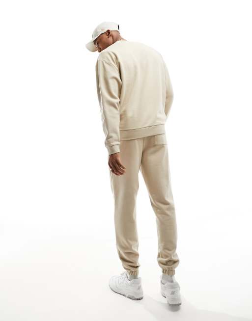 ASOS DESIGN – Trainingsanzug aus Oversize-Sweatshirt und schmal zulaufender Jogginghose in Beige, 3 von 4
