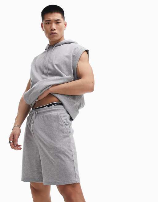 ASOS DESIGN – Trainingsanzug in grau meliert mit ärmellosem Oversize-Kapuzenpullover und schmalen Shorts