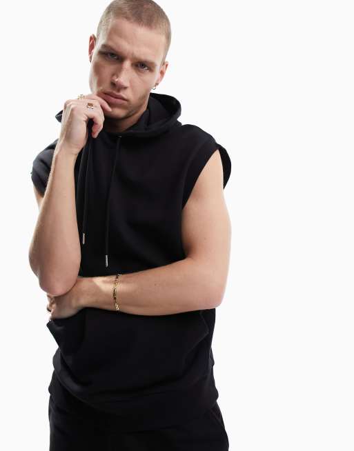 ASOS DESIGN – Trainingsanzug mit ärmellosem Oversize-Kapuzenpullover und schmalen Shorts in Schwarz