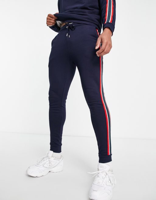 ASOS DESIGN - Trainingspak met biezen & sweatshirt met halve rits in marineblauw, 2 van 4