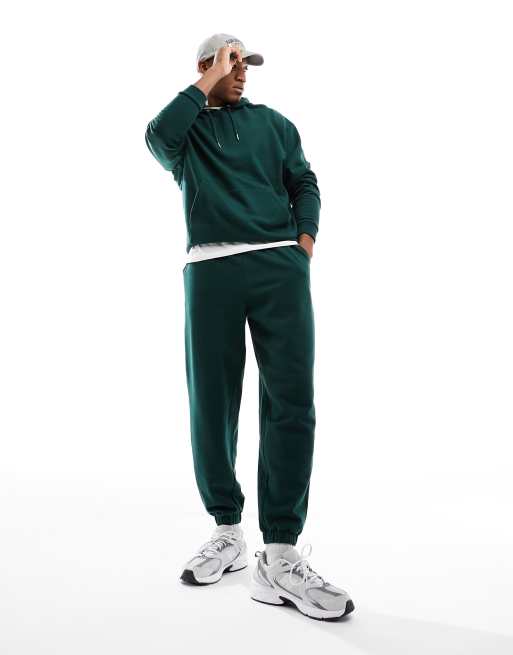 ASOS DESIGN - Trainingspak met oversized hoodie en joggingbroek in donkergroen
