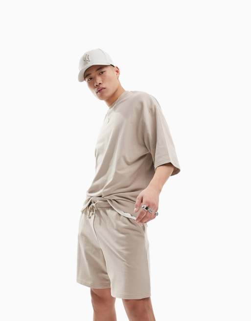 ASOS DESIGN - Trainingspak met oversized sweatshirt met korte mouwen en smalle short in beige 