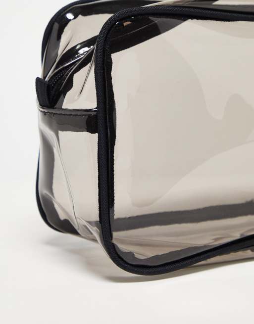 ASOS DESIGN transparent wash bag with handle in black