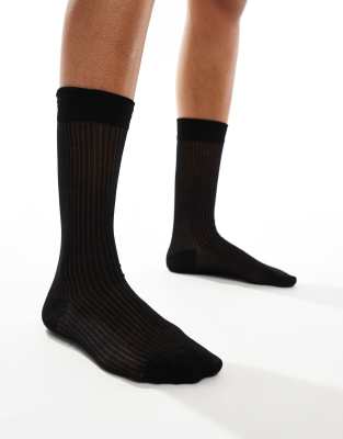 ASOS DESIGN - Transparente, gerippte Socken in Schwarz