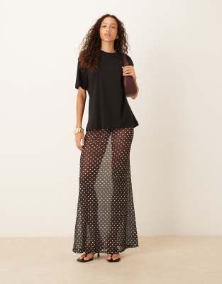 ASOS DESIGN - Transparenter Netzstoff-Maxirock in Schwarz mit Polka Dots-Bunt