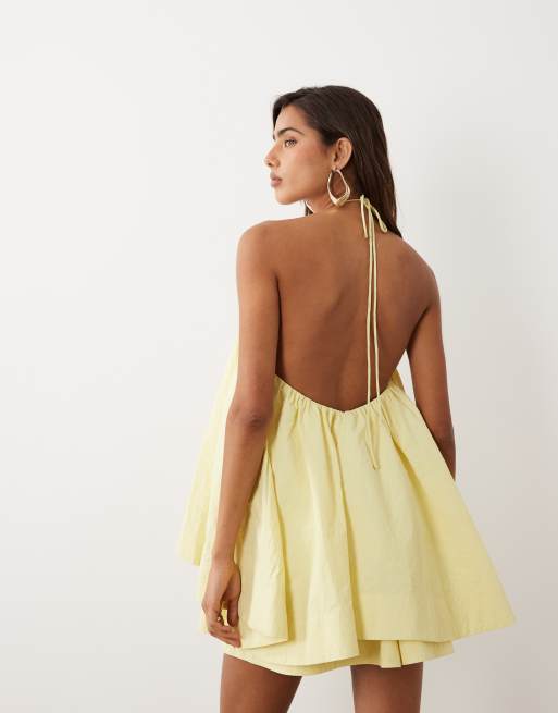 ASOS DESIGN – Trapezförmiges Neckholder-Minikleid in Sanftgelb, 3 von 4