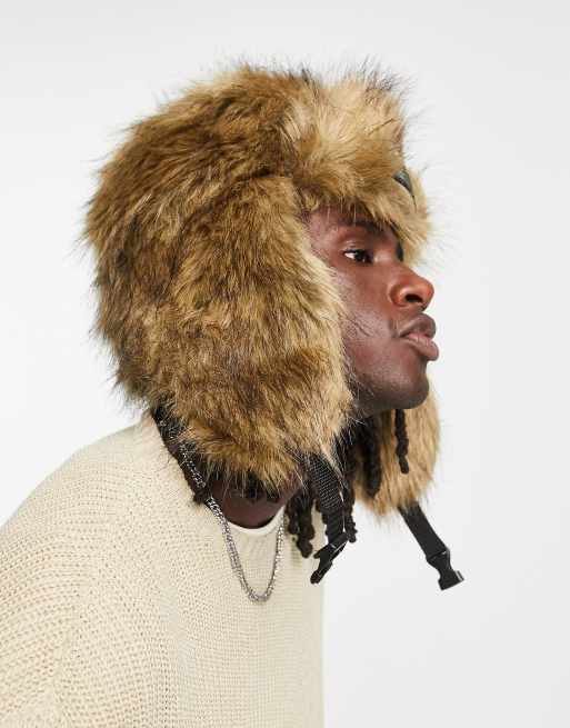 ASOS DESIGN trapper hat with badge in brown faux fur