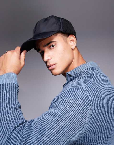 ASOS DESIGN – Trappermütze aus Nylon in Schwarz mit Teddyfleece - view 1