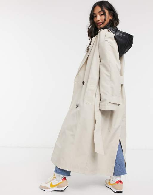 Trench coat with store detachable hood